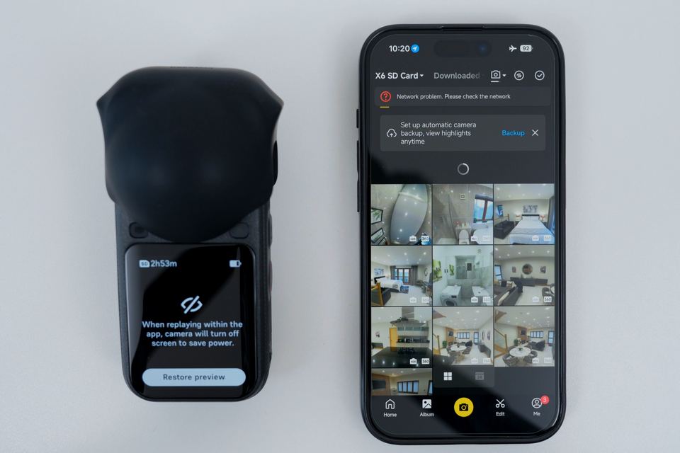 A 360 camera next to a phone showing 360 photos ready to export to the phone